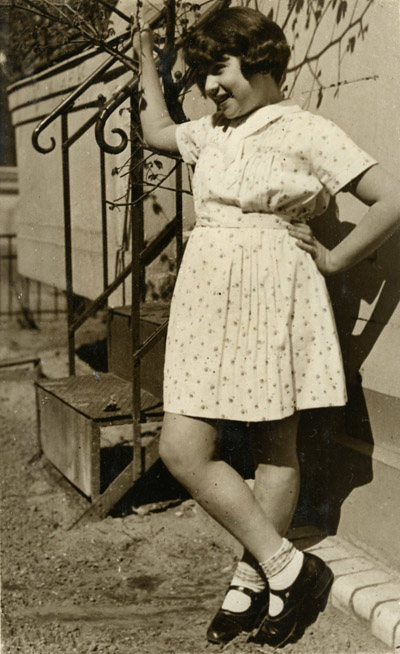 May 1932, Eva posing outside, with her father behind the camera, a year before he dies.