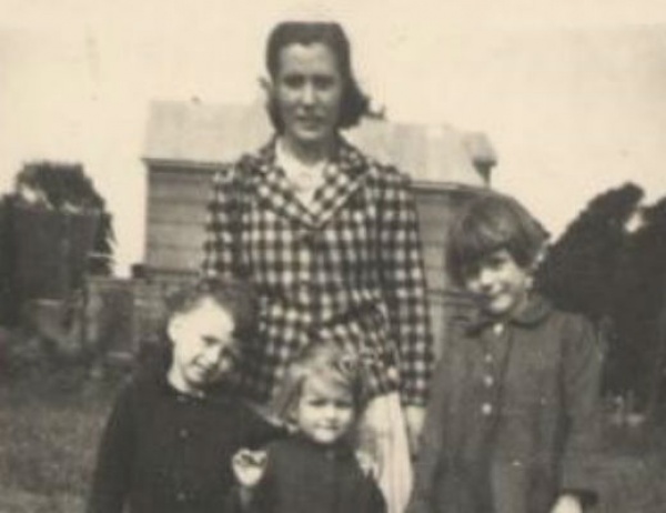 Hester Kool with children she cared for while in hiding 1945