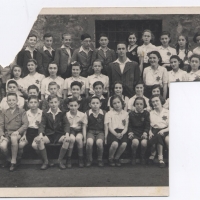 Frieda's class photo from 1941. Frieda (second row from the top, left of the teacher) was one of the only children from this class to survive. After the war, she cut out pieces of the photo to give to surviving family members.
