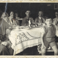 Heinz at the table with family, 1936.