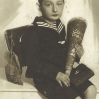 Heinz' first day at school with his shultute, a cardboard cone filled with sweets given to students by their families.