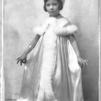 Zahava in her Purim dress that her mother made for her and that the Germans took from her house