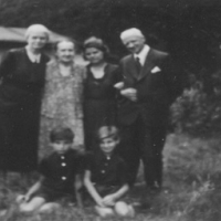 An SS Colonel on the right, his daughter next to him, followed by Frl. Nölting and then the Colonel’s wife. Brother Henri is sitting on the left and Fred is on the right. (May 1943)